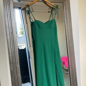 Green corset dress super flattering fit small slit in the front stretchy back.
